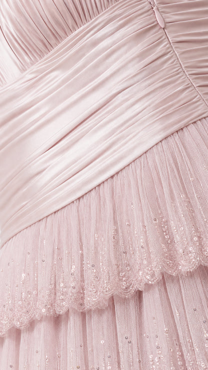 Close-up of ruched bodice and sequin mesh tiers