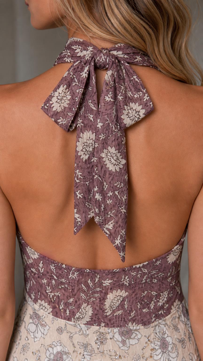 Close-up of back tie bow and halter neckline detail
