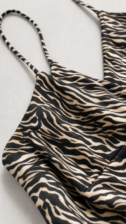 Close-up detail of fabric texture and spaghetti straps
