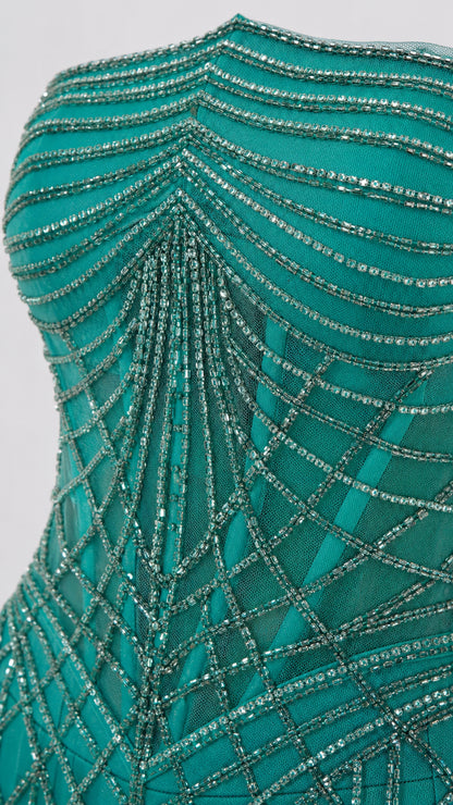 Close-up detail of geometric crystal beadwork on bodice