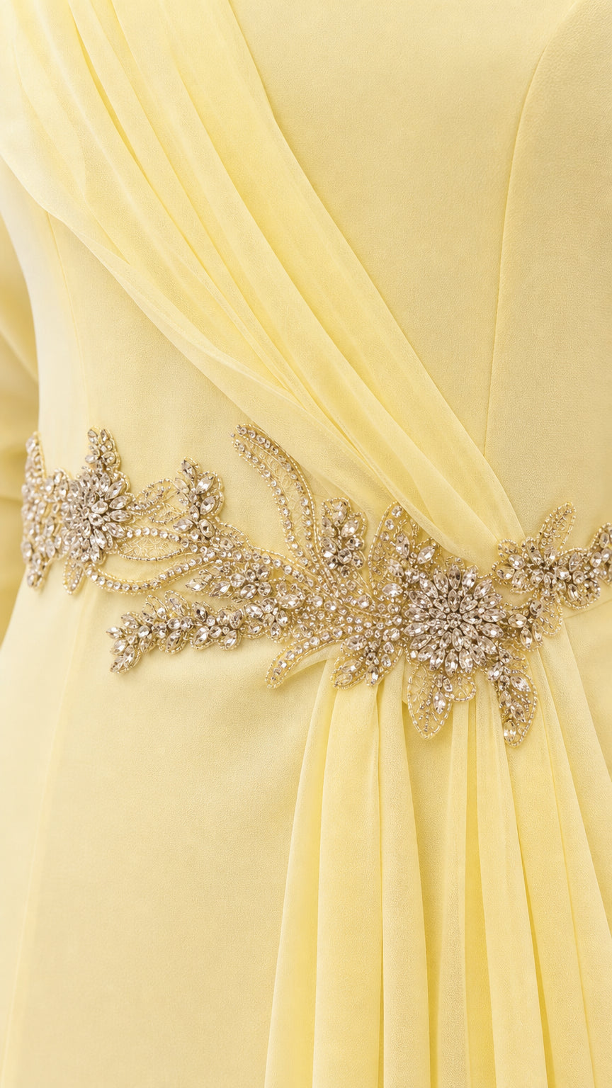 Close-up detail of intricate rhinestone and crystal beaded embellishment on waist