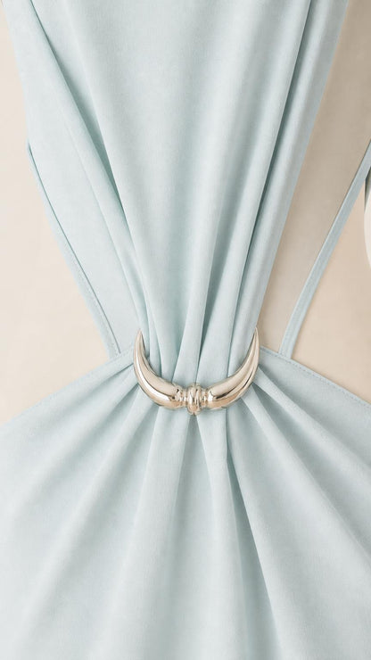 Close-up of silver ring hardware detail on Light Blue dress