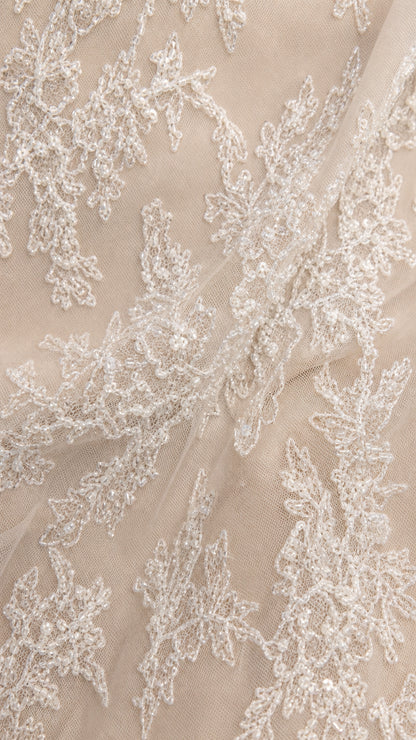 Close-up of intricate floral lace fabric texture and pattern
