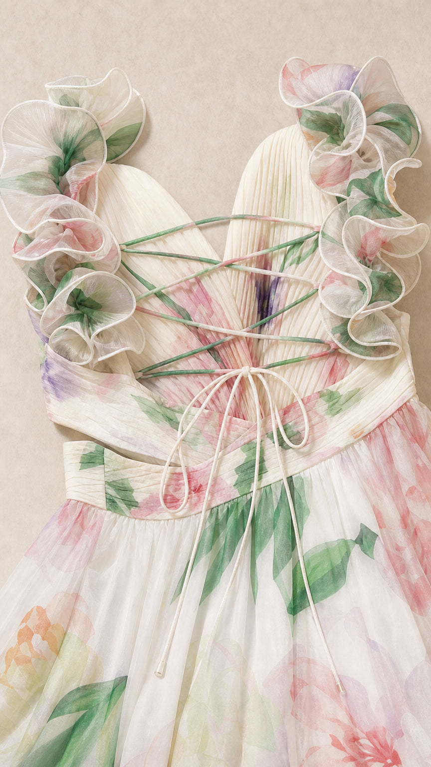 Close-up of ruffles and lace-up back on floral dress