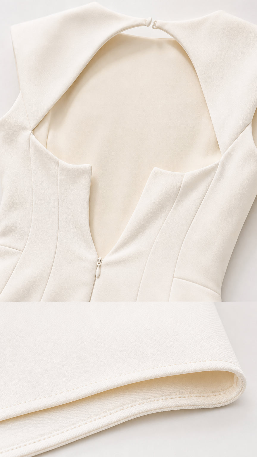 Close-up of back cutout and fabric texture of white top