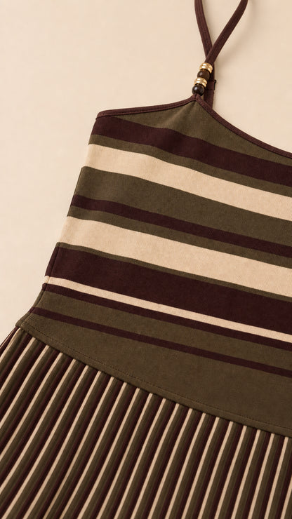 Close-up detail of knit fabric stripes and beaded shoulder strap