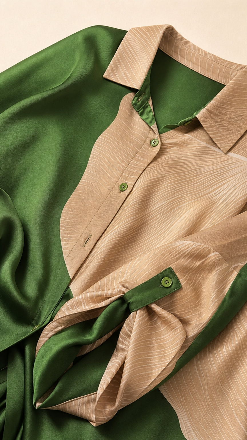Close-up detail of green and beige shirt collar and sleeve tab