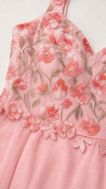 Close-up of floral embroidery on bodice