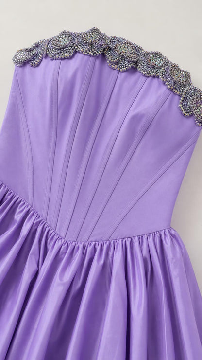 Close-up detail of embellished crystal beaded neckline and bodice