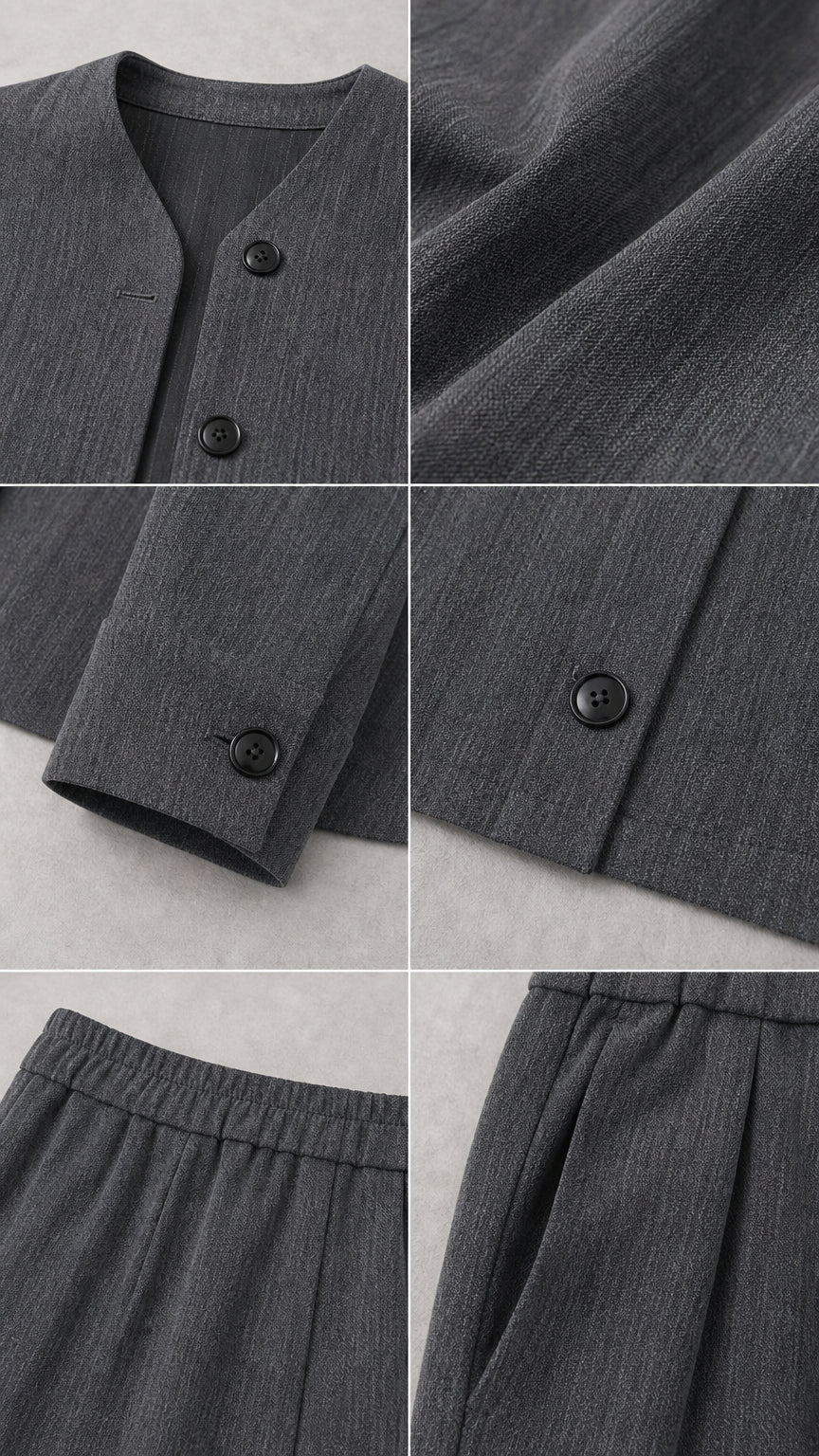 Close-up details of collarless neckline, textured fabric, cuffs, and elastic waistband