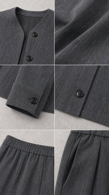 Close-up details of collarless neckline, textured fabric, cuffs, and elastic waistband