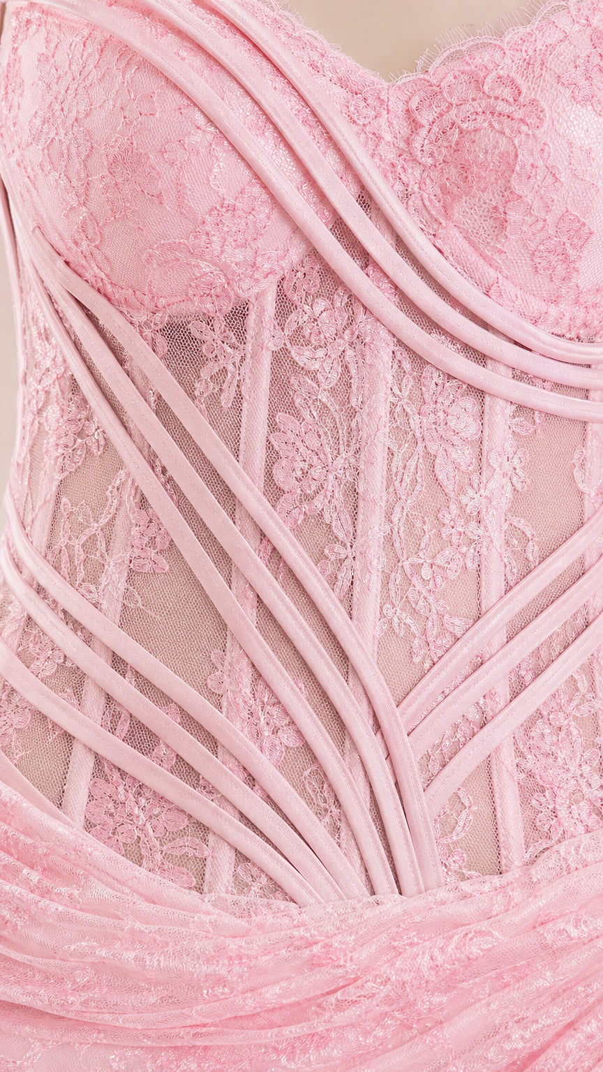 Close-up detail of sheer corset bodice and lace overlay