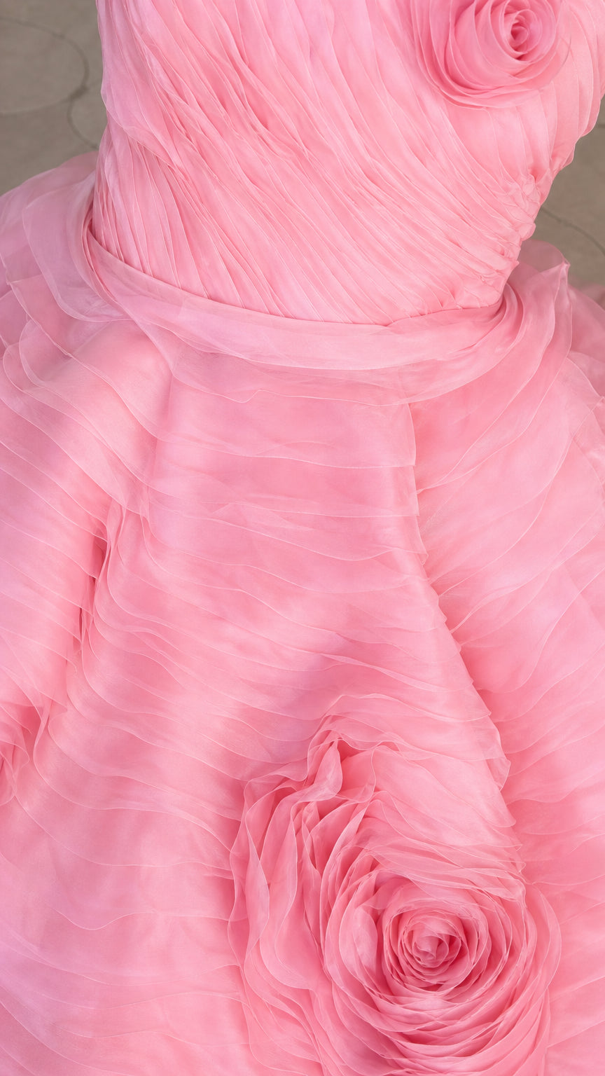 Close-up detail of fabric texture and 3d rose applique
