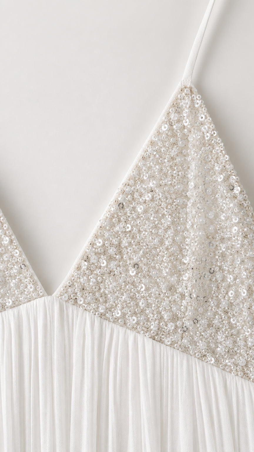 Close up detail of sequin embellished V-neck bodice