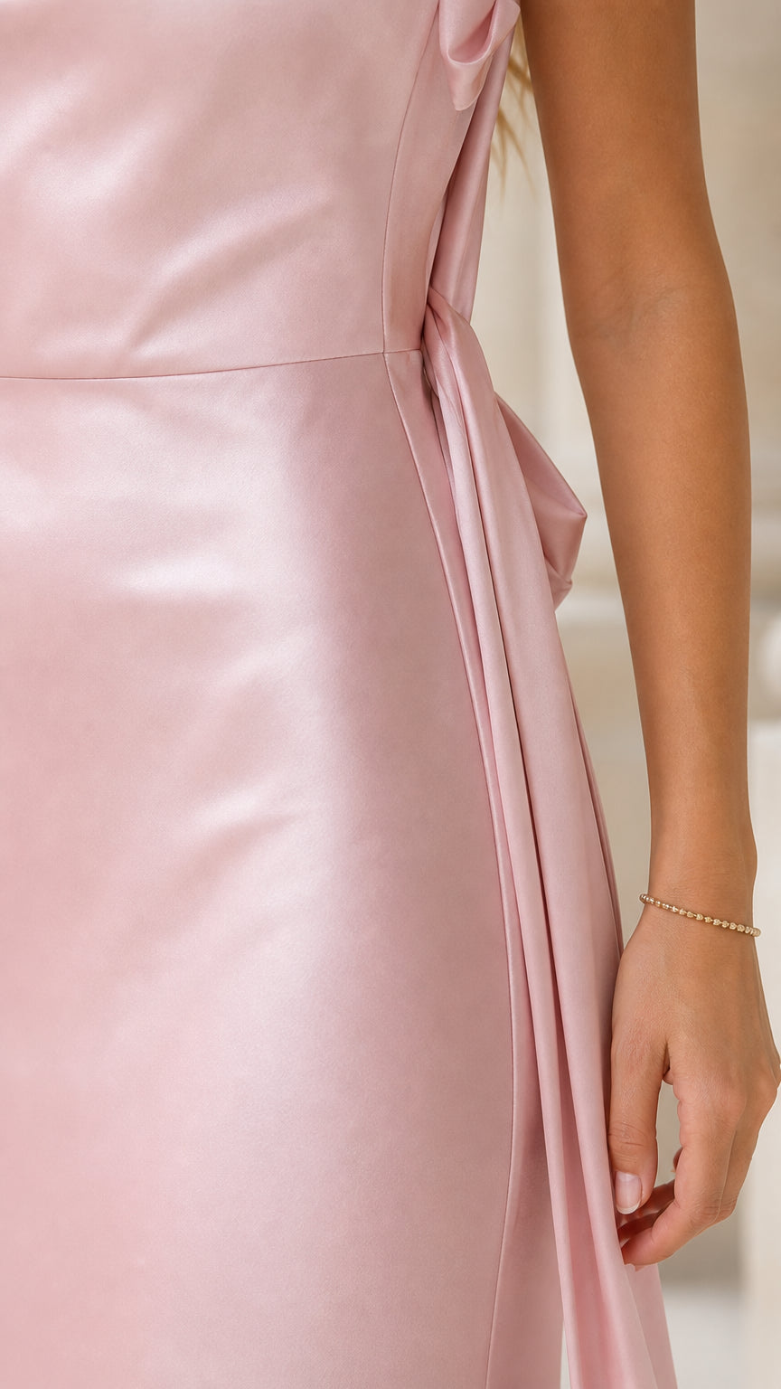 Close-up detail of side sash and smooth satin fabric