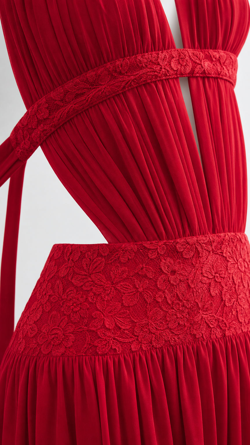 Close-up detail of pleated bodice and lace waist trim in red