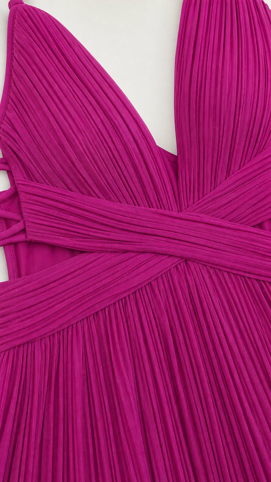 Close-up detail of pleated fabric and waist crossover design