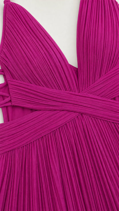 Close-up detail of pleated fabric and waist crossover design