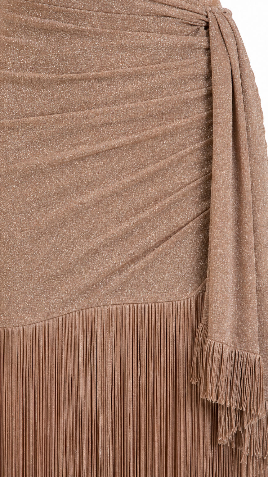 Close-up of shimmer fabric texture and fringe hem