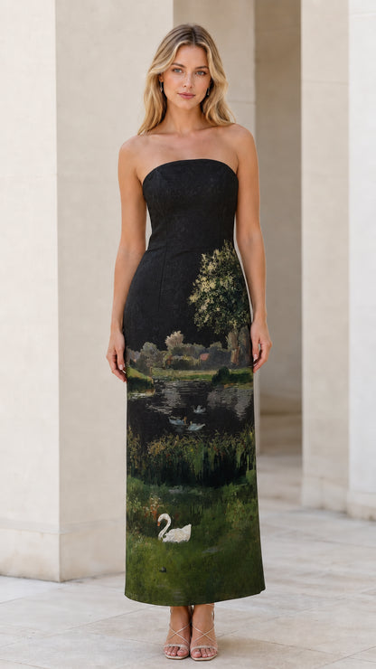 Model wearing black landscape strapless maxi dress