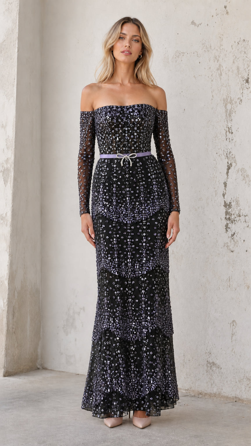 Model wearing black sequin off-shoulder evening gown