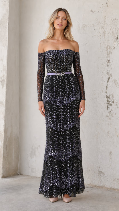 Model wearing black sequin off-shoulder evening gown
