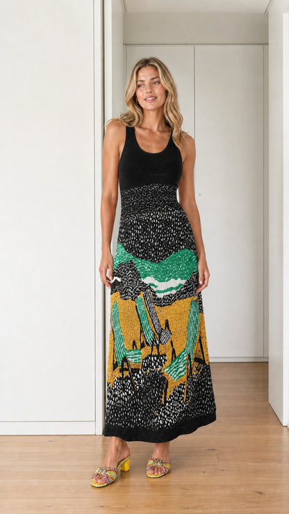 Front view of black landscape knit maxi dress