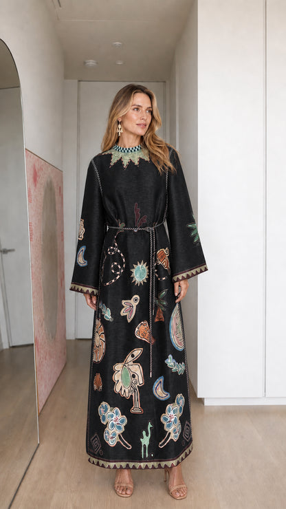 Model wearing black boho printed long sleeve maxi dress