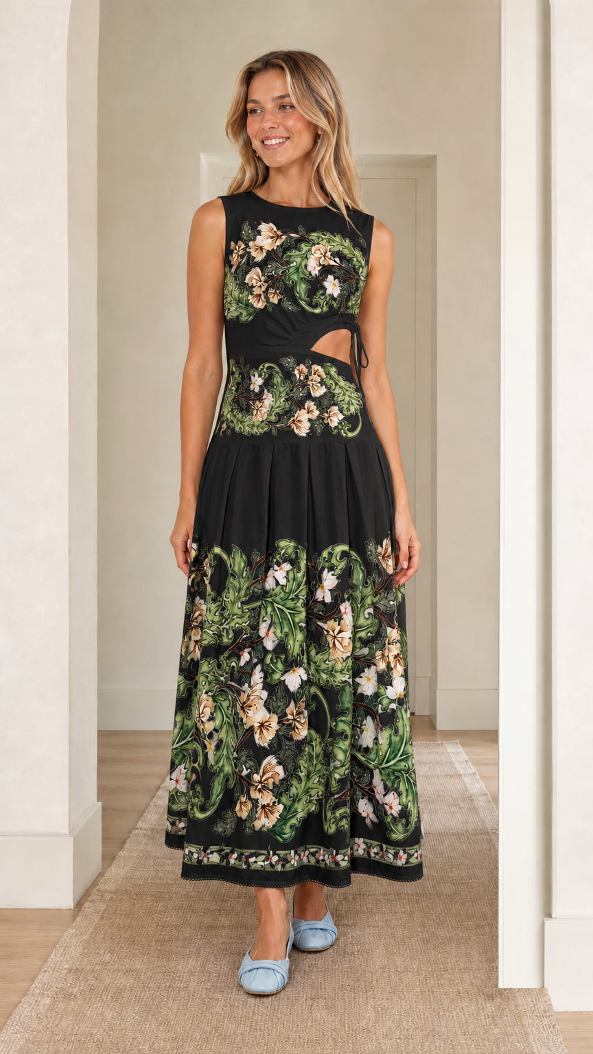 Woman wearing black floral print cutout maxi dress