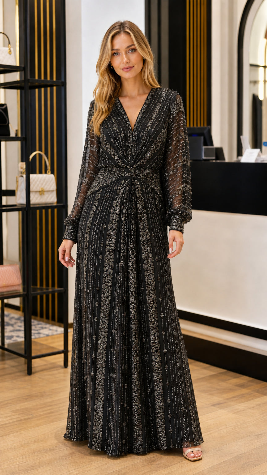 Full front view of black long sleeve beaded evening maxi gown