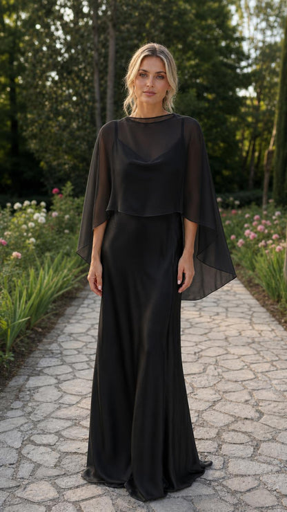 Model wearing black capelet evening dress