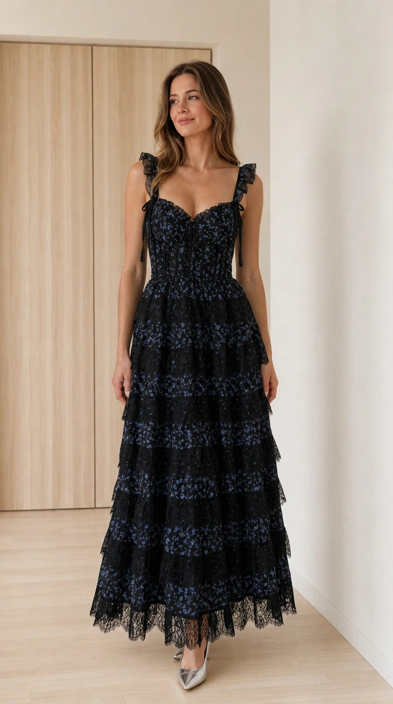 Front full view of black floral lace tiered maxi dress