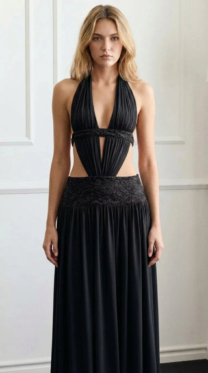 Front view of black halter cutout maxi dress