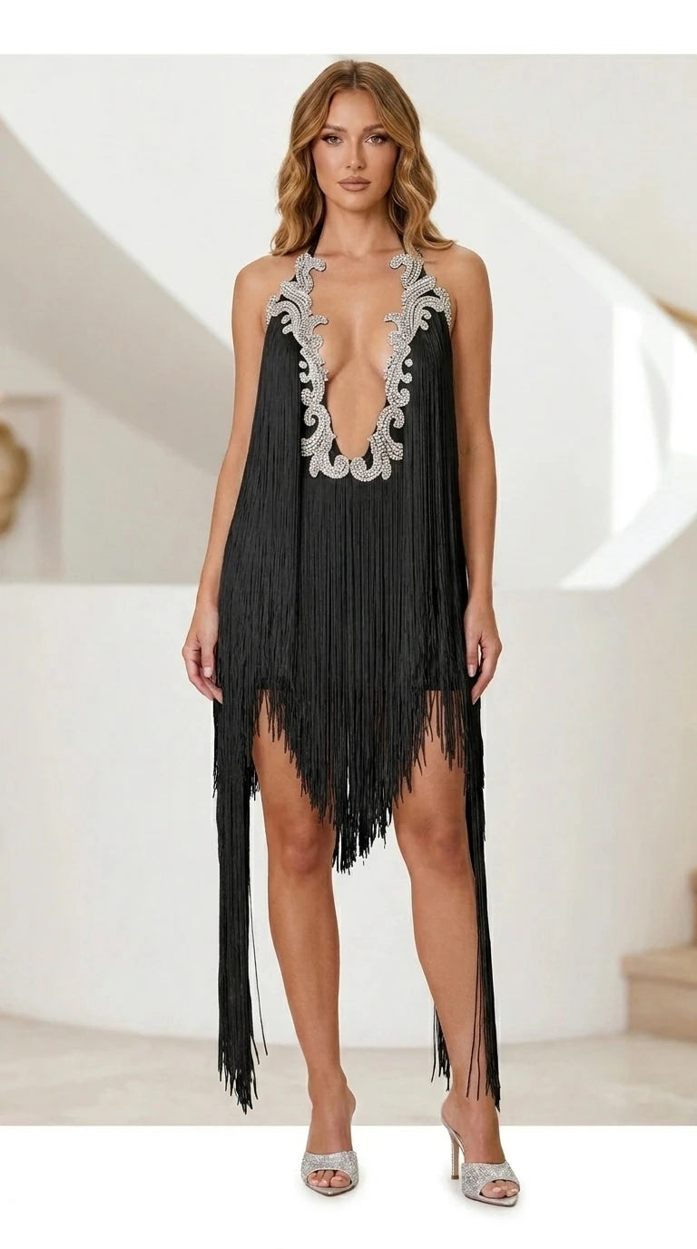 Model wearing black fringe halter mini dress