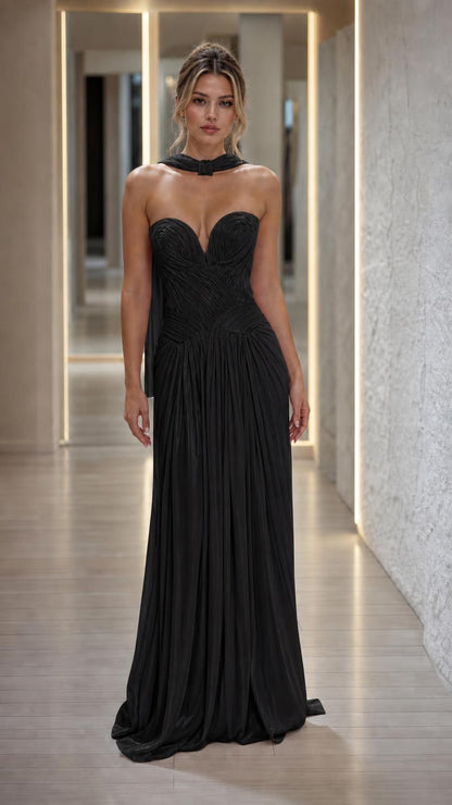 Front view of black pleated strapless evening dress
