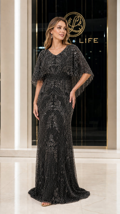 Front view of woman wearing black beaded evening gown