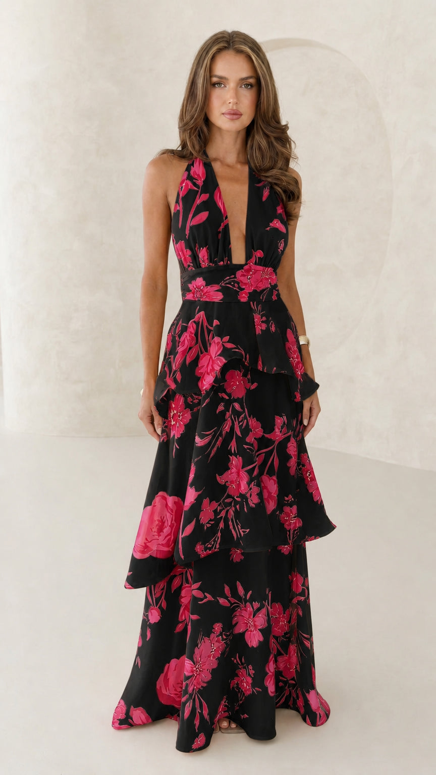 Front view of black floral halter neck maxi dress