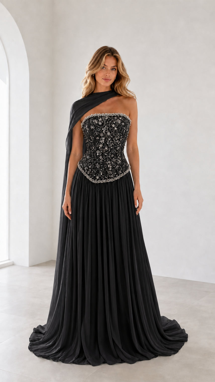 Full front view of black one-shoulder beaded corset evening gown