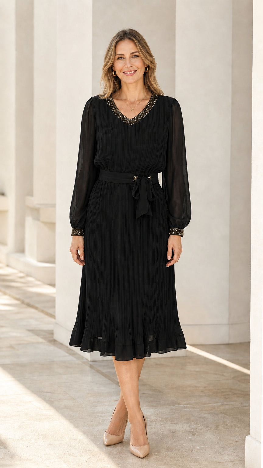 Front view of black long sleeve pleated midi dress