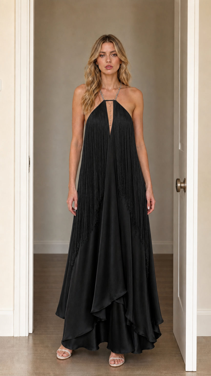 Front view of model wearing Black halter fringe maxi dress