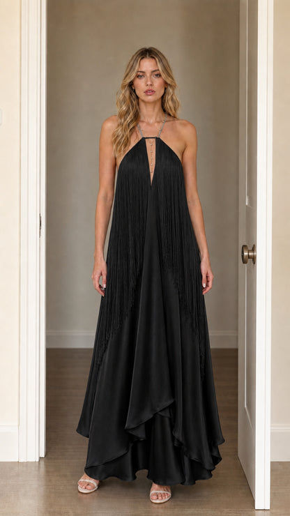 Front view of model wearing Black halter fringe maxi dress