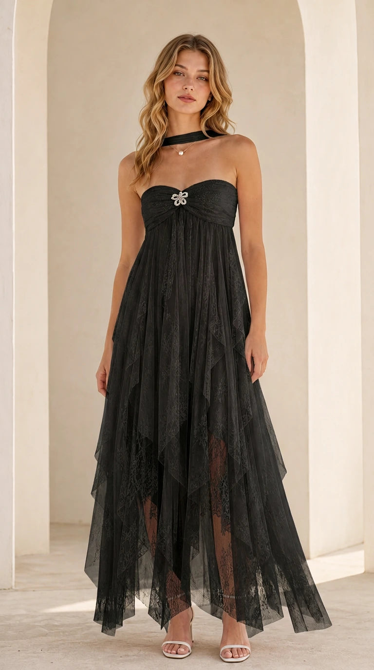 Model wearing black strapless tulle maxi dress