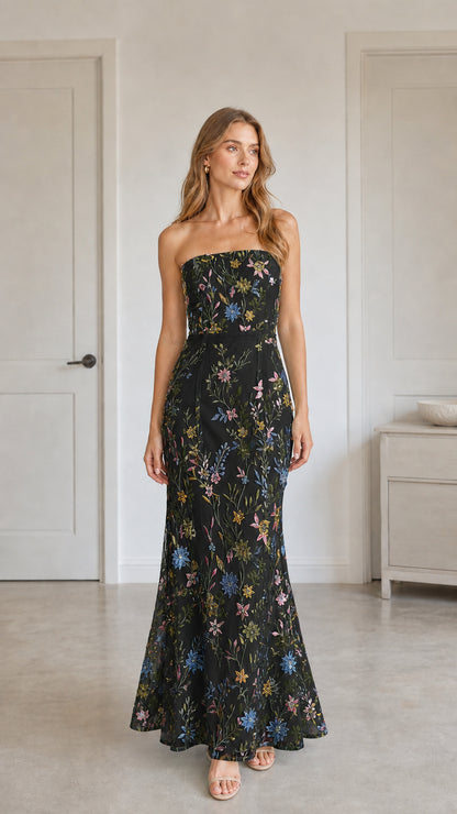 Front view of black floral embroidered strapless maxi dress