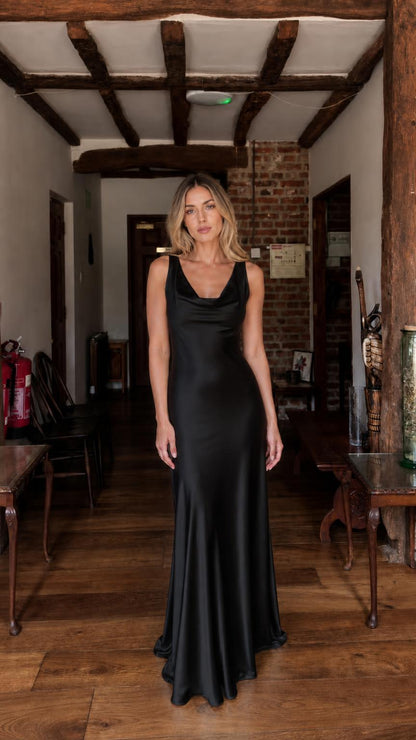 Front view of black satin maxi dress