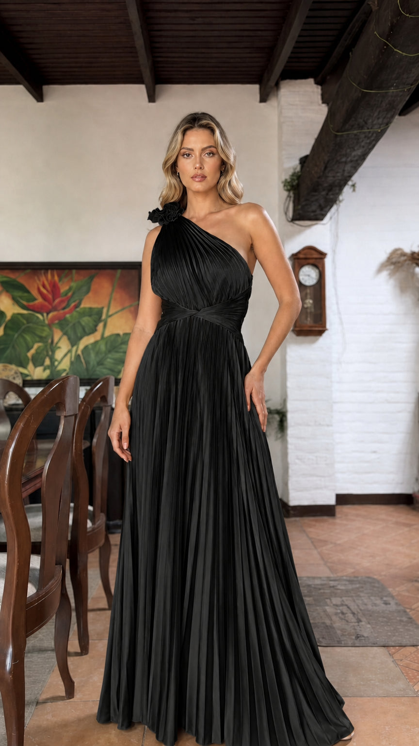 Front view of black one-shoulder pleated maxi dress