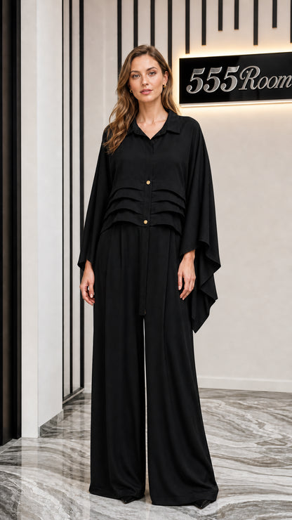 Front view of model wearing black two-piece set