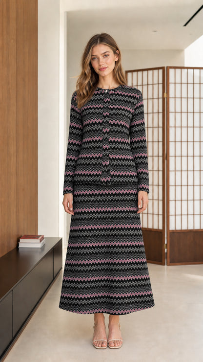 Front view of model wearing black and charcoal chevron knit two-piece maxi set