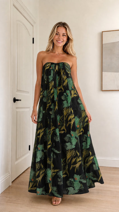 Model wearing black floral strapless maxi dress
