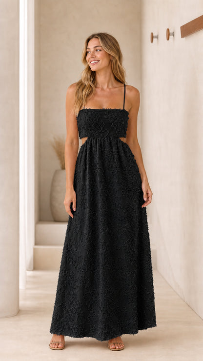 Front view of black textured cutout maxi dress