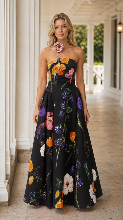 Front view of black floral strapless maxi dress